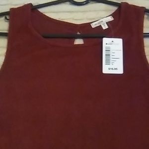 Brand Love Culture. New with tags sleeveless blouse detailed bottom. Size large.